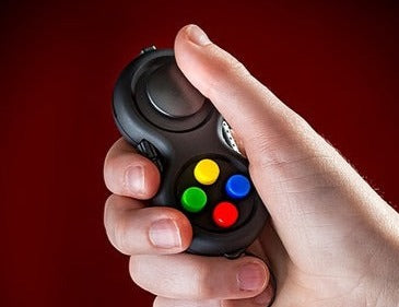 black fidget pad with coloured buttons